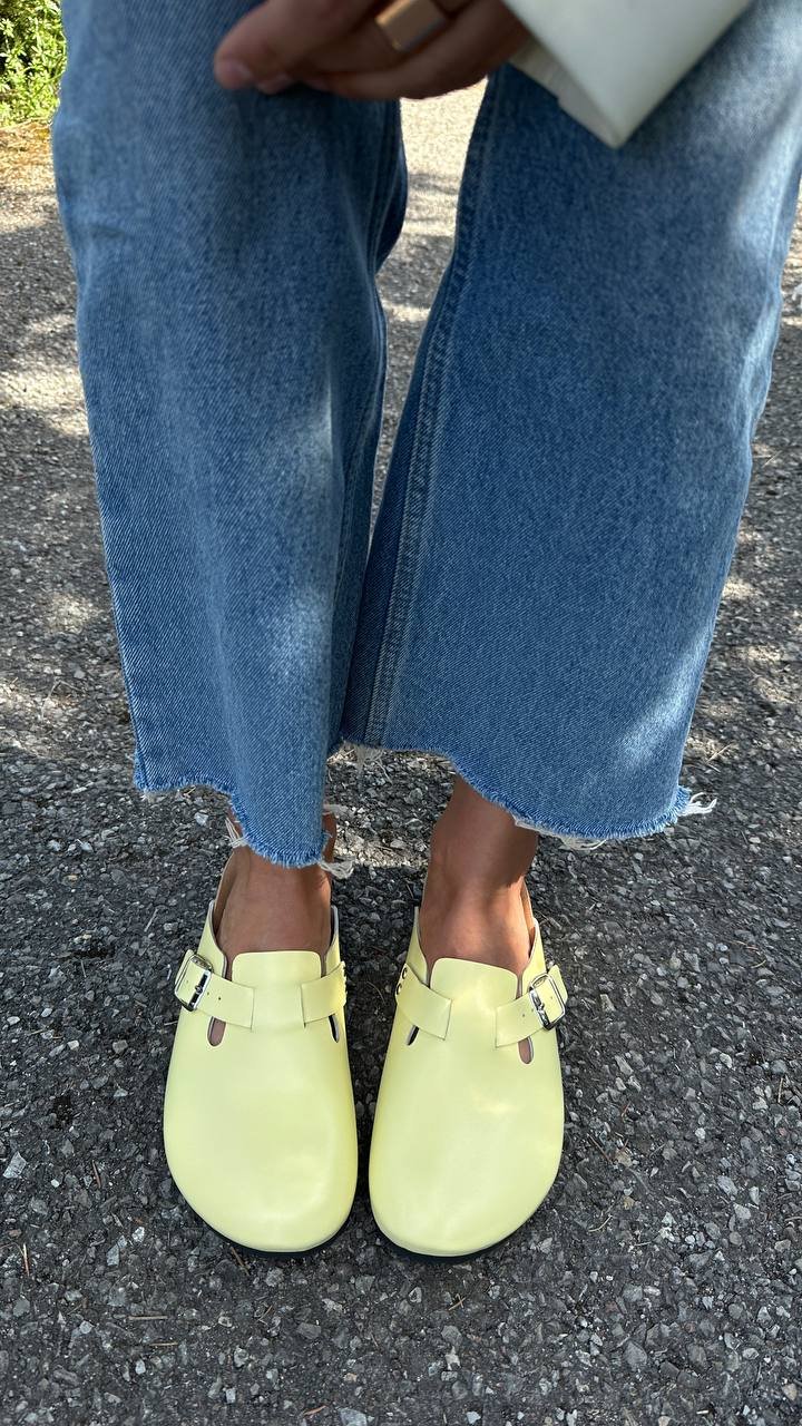 Clogs with orthopedic soles